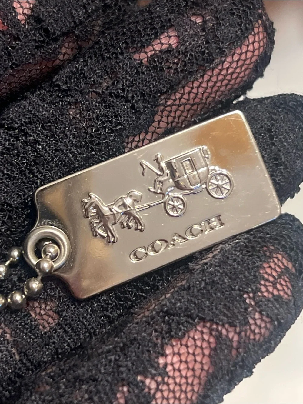 Coach Silver Tone Embossed Horse & Carriage Dog Tag Keychain